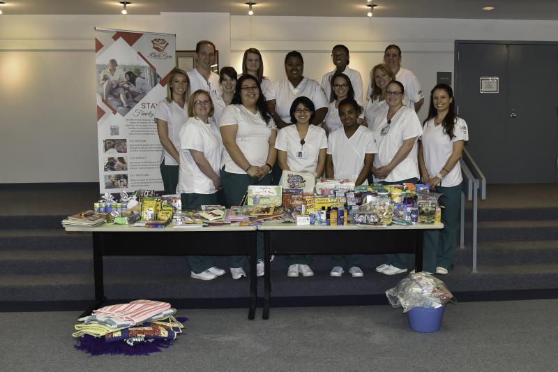Delaware Tech nursing students in the Essentials of Maternal Child Health course pose next to the items they gathered to donate to the Alana Rose Foundation. Shown are in back (l-r) Seth Kuchar, Maci Derrickson, Jasmine Nicholson, Shanice Smiley and Kathleen Gearhart. In the middle are Jamie Betts, Hanna Kaifer, Carrie Bullen and Terri Brisbane. In front are Jennifer Zane, Hanays Haro-Purato, Nora Perez-Velasquez, Shaday Schoofield, Kathleen Esposito and Mariya Soto. SUBMITTED PHOTO